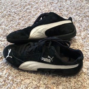 Women’s black Puma shoes